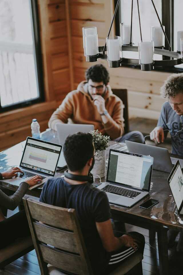 {companyName} team collaborating in a modern office environment
